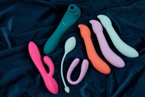 Sex toys on a blue fabric