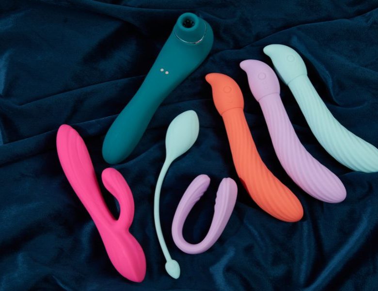 Sex toys on a blue fabric
